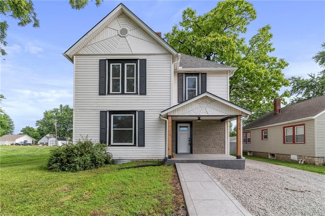 306 W 4th St, Cameron, MO 64429 - view of front of property featuring a porch and a front yard