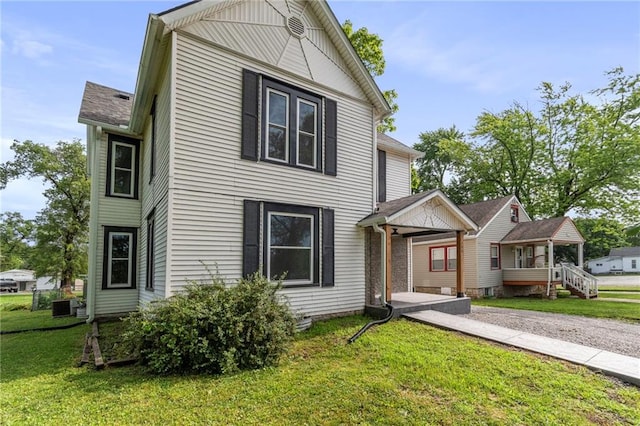 306 W 4th St, Cameron, MO 64429 - view of front of home with a front yard