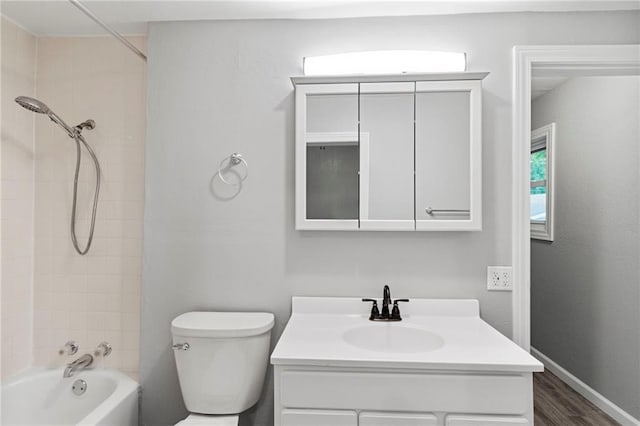 306 W 4th St, Cameron, MO 64429 - full bathroom with vanity, shower / bathtub combination, and wood finished floors