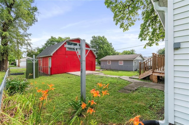 306 W 4th St, Cameron, MO 64429 - view of yard featuring a storage shed