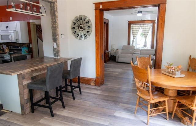 1912 S 24th St, Saint Joseph, MO 64507 - dining area featuring light wood finished floors