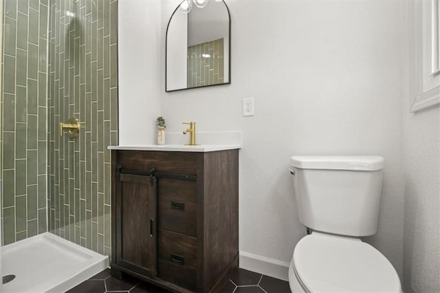 5015 S Marion Ave, Independence, MO 64055 - bathroom with a tile shower, vanity, and tile patterned floors
