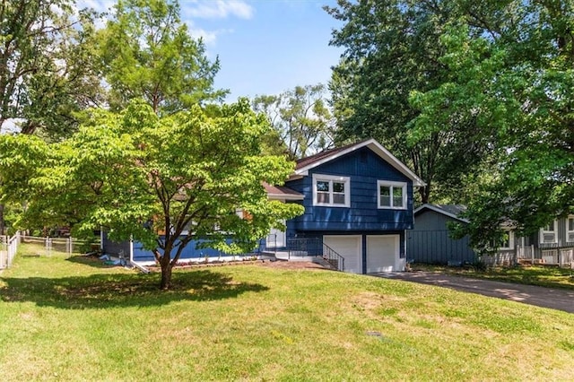 5015 S Marion Ave, Independence, MO 64055 - view of front facade featuring driveway and a garage