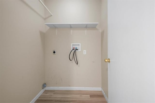 802 W 39th St N, Independence, MO 64050 - washroom featuring washer hookup, electric dryer hookup, and light wood finished floors
