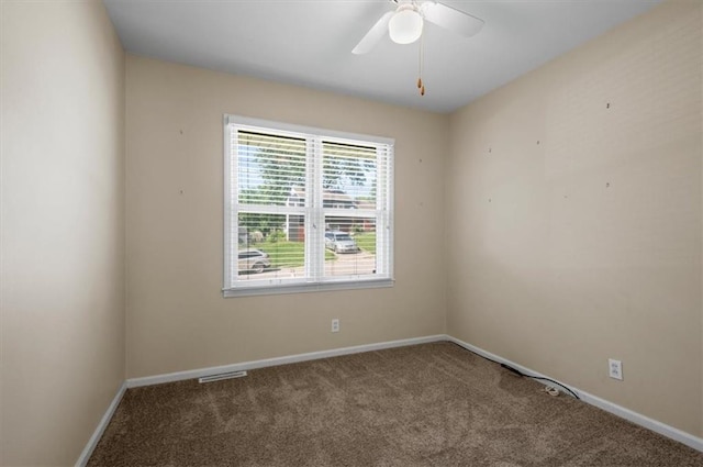 802 W 39th St N, Independence, MO 64050 - empty room featuring carpet flooring and a ceiling fan