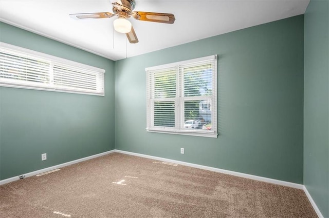 802 W 39th St N, Independence, MO 64050 - empty room featuring carpet and a ceiling fan