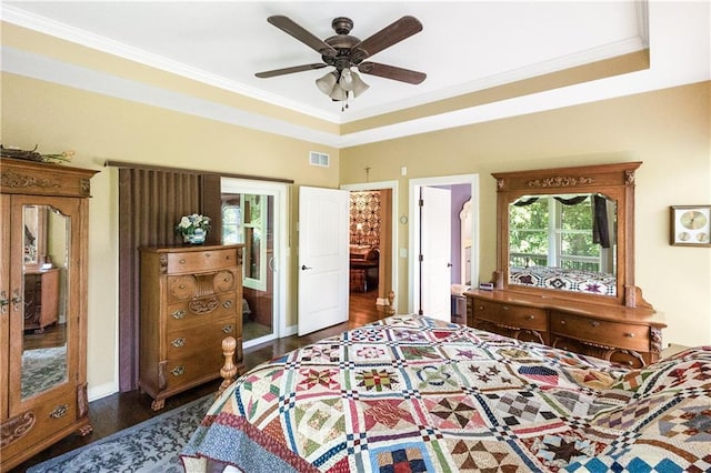 1310 Norfolk Dr, Harrisonville, MO 64701 - bedroom featuring wood finished floors, ornamental molding, a tray ceiling, and ceiling fan
