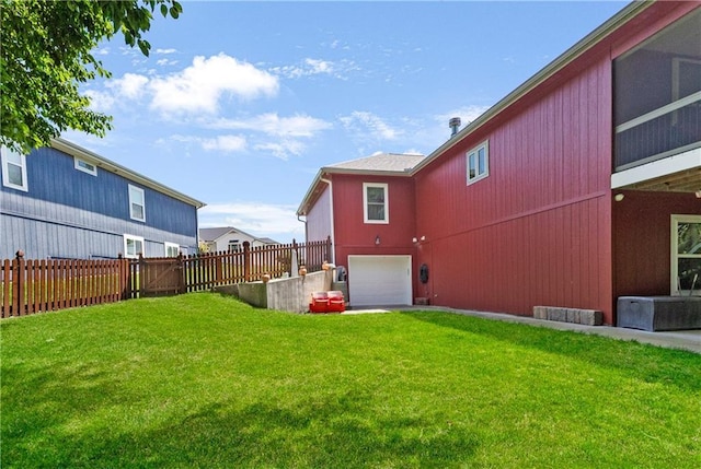 1310 Norfolk Dr, Harrisonville, MO 64701 - back of property with a garage
