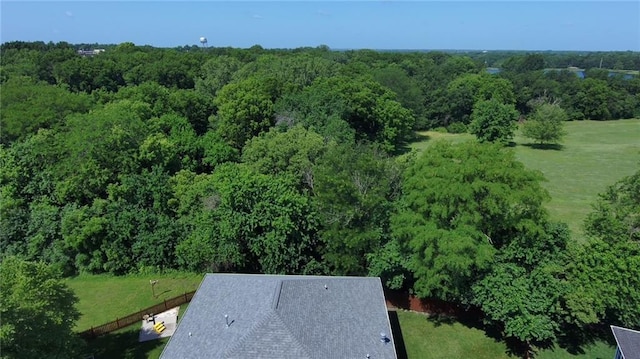 1310 Norfolk Dr, Harrisonville, MO 64701 - view from above of property with a heavily wooded area