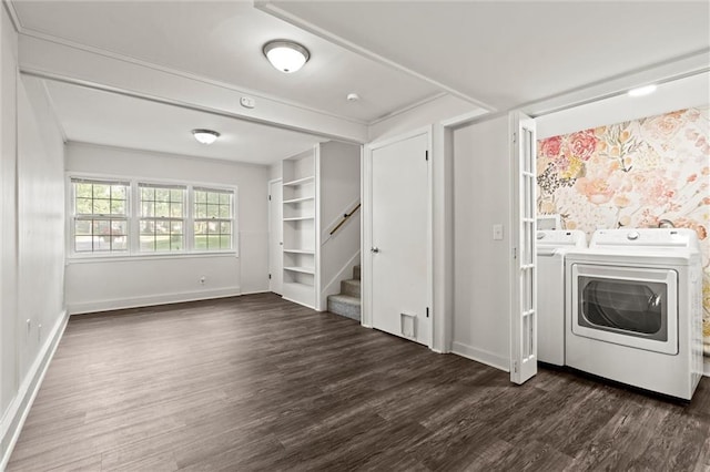 331 E 100th Ter, Kansas City, MO 64114 - washroom featuring washing machine and clothes dryer and dark wood-style floors