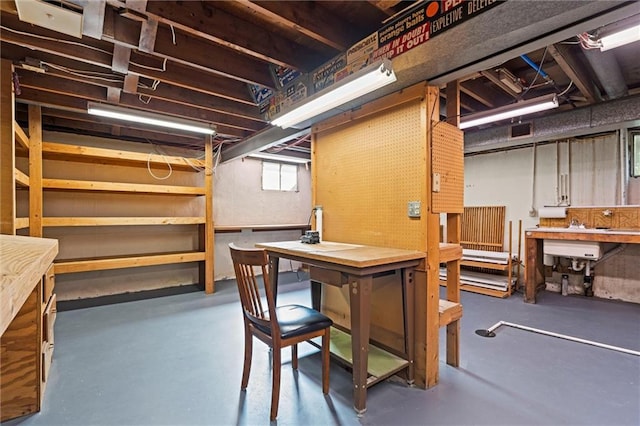 331 E 100th Ter, Kansas City, MO 64114 - basement featuring a workshop area