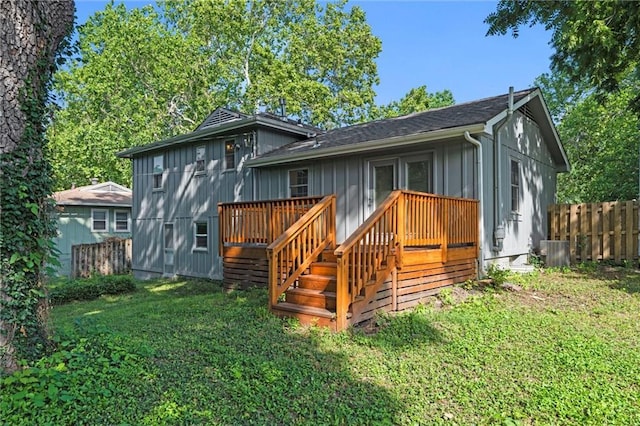 331 E 100th Ter, Kansas City, MO 64114 - back of property with a wooden deck