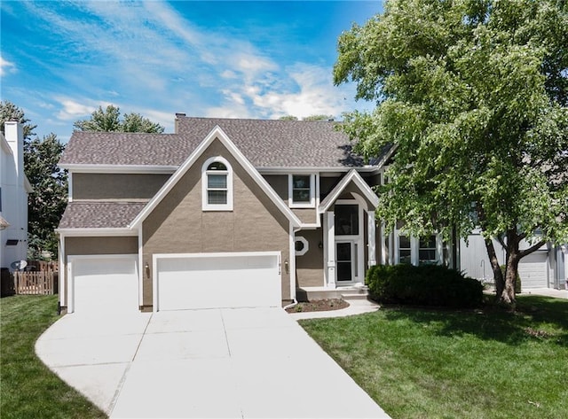 11912 W 132nd St, Overland Park, KS 66213 - traditional-style house with stucco siding, driveway, and a garage