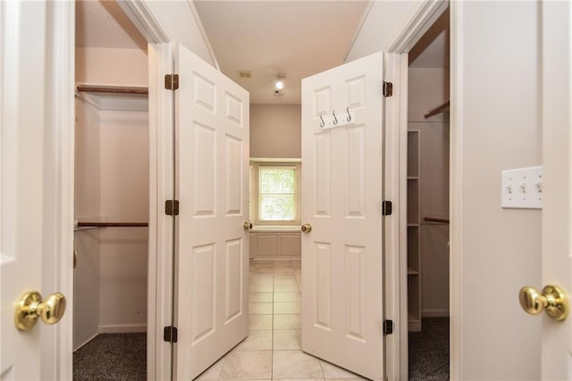 11912 W 132nd St, Overland Park, KS 66213 - corridor featuring light tile patterned floors and baseboards