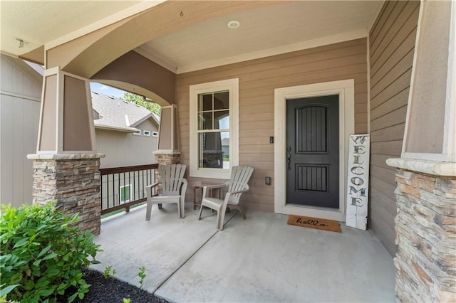 4890 NW Linder Ln, Riverside, MO 64150 - entrance to property featuring covered porch and stone siding