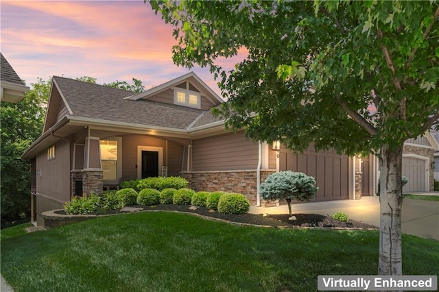 4890 NW Linder Ln, Riverside, MO 64150 - craftsman house featuring stone siding, a front lawn, a shingled roof, concrete driveway, and an attached garage