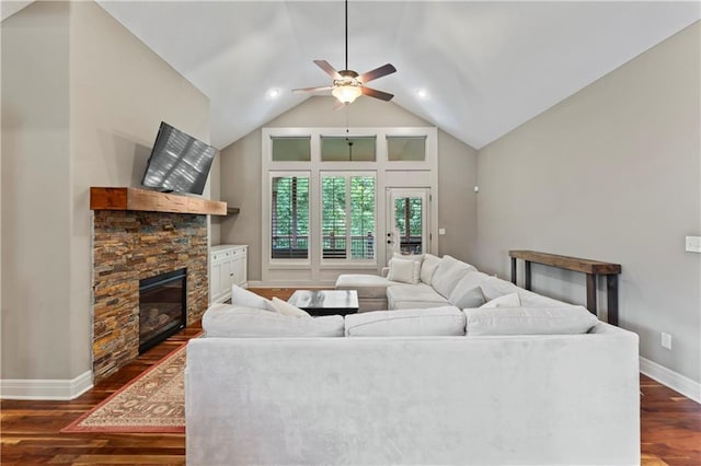 4890 NW Linder Ln, Riverside, MO 64150 - living room featuring a ceiling fan, dark wood finished floors, a fireplace, lofted ceiling, and recessed lighting