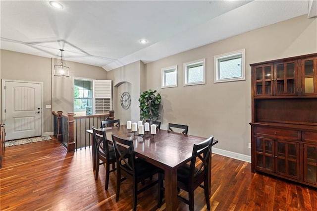 4890 NW Linder Ln, Riverside, MO 64150 - dining room featuring healthy amount of natural light, dark wood finished floors, recessed lighting, arched walkways, and lofted ceiling