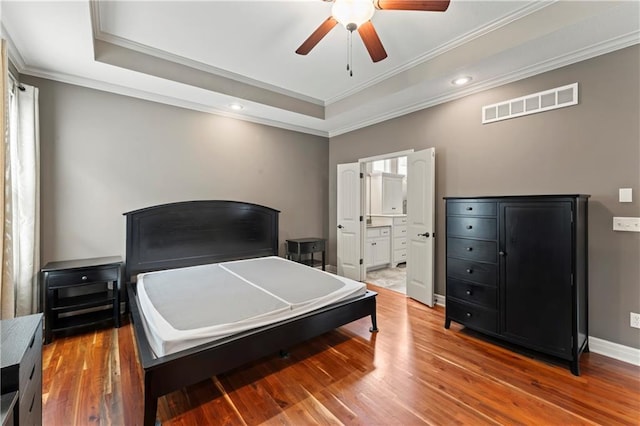 4890 NW Linder Ln, Riverside, MO 64150 - bedroom with a raised ceiling, ornamental molding, wood finished floors, recessed lighting, and a ceiling fan