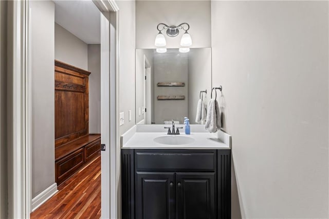 4890 NW Linder Ln, Riverside, MO 64150 - bathroom with vanity and wood finished floors