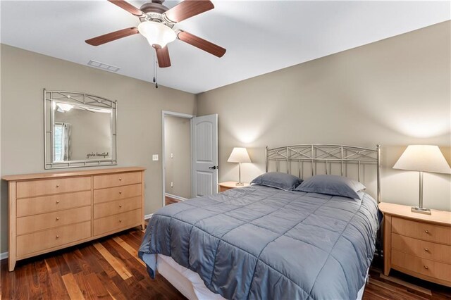 4890 NW Linder Ln, Riverside, MO 64150 - bedroom featuring dark wood-style flooring and a ceiling fan