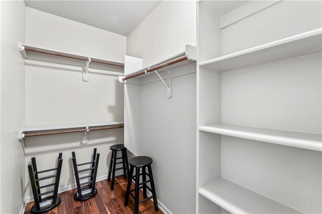 4890 NW Linder Ln, Riverside, MO 64150 - spacious closet featuring wood finished floors