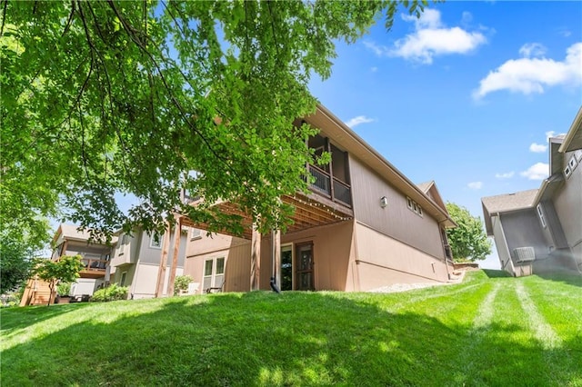 4890 NW Linder Ln, Riverside, MO 64150 - rear view of house featuring a yard