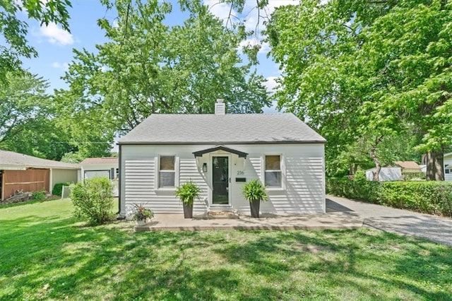 236 W Park St, Gardner, KS 66030 - bungalow-style home with a chimney
