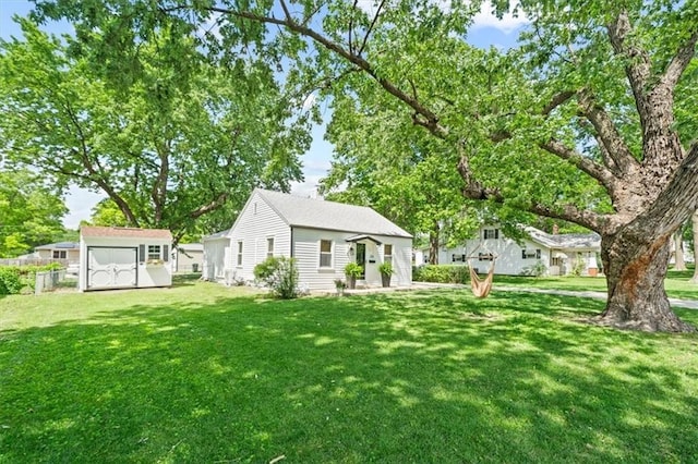 236 W Park St, Gardner, KS 66030 - view of grassy yard featuring a storage shed