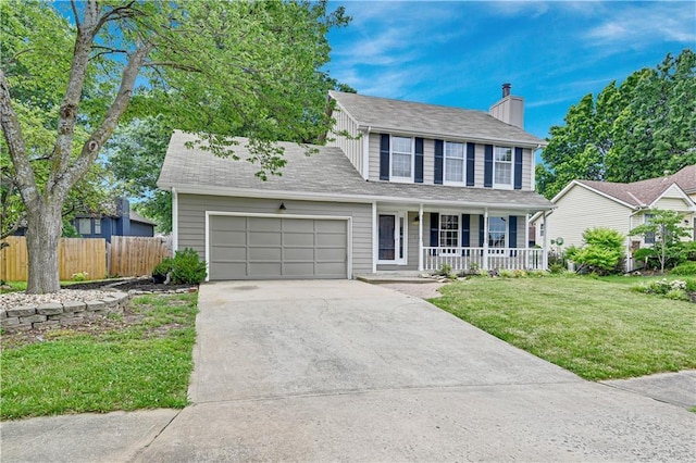 16117 W 125th Ter, Olathe, KS 66062 - view of front of property featuring a porch, an attached garage, driveway, and a chimney