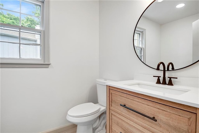 16117 W 125th Ter, Olathe, KS 66062 - half bathroom with vanity and recessed lighting