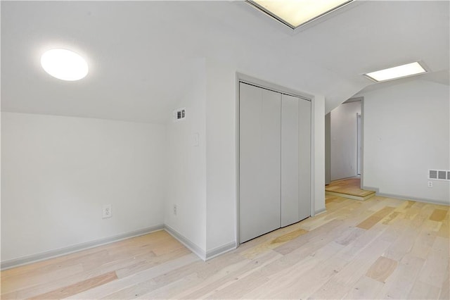 16117 W 125th Ter, Olathe, KS 66062 - bonus room featuring vaulted ceiling and light wood-style floors