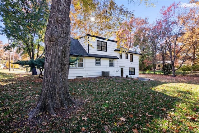 3322 W 95th St, Leawood, KS 66206 - rear view of property featuring a lawn