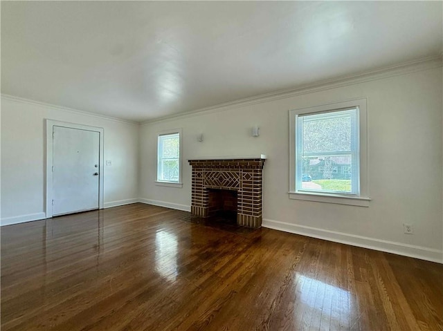 2416 E 70th St, Kansas City, MO 64132 - unfurnished living room featuring wood finished floors, crown molding, and a fireplace