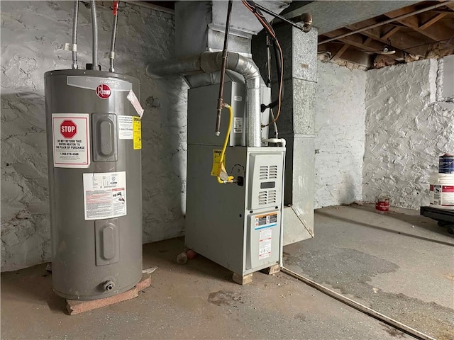 2416 E 70th St, Kansas City, MO 64132 - utility room featuring water heater and heating unit