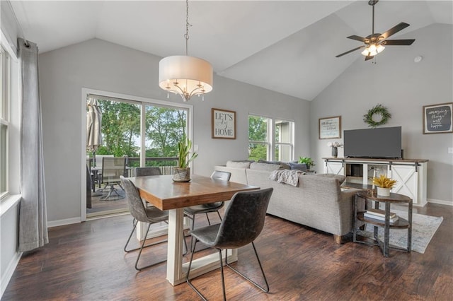 2712 E Sycamore St, Tonganoxie, KS 66086 - dining area featuring high vaulted ceiling, dark wood finished floors, ceiling fan, and a chandelier