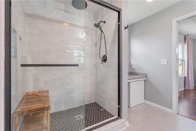 2712 E Sycamore St, Tonganoxie, KS 66086 - bathroom featuring a stall shower and tile patterned flooring