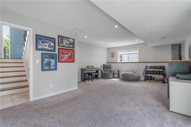 2712 E Sycamore St, Tonganoxie, KS 66086 - sitting room featuring carpet floors, recessed lighting, and stairway