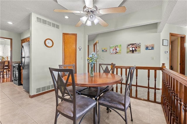 3602 S Sweeney Rd, Grain Valley, MO 64029 - dining room with a textured ceiling, light tile patterned flooring, a ceiling fan, and recessed lighting
