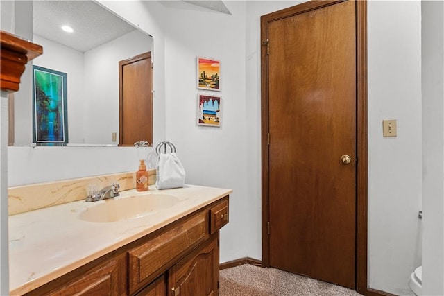 3602 S Sweeney Rd, Grain Valley, MO 64029 - bathroom with vanity and recessed lighting