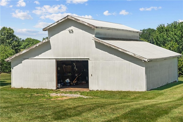 3602 S Sweeney Rd, Grain Valley, MO 64029 - view of barn featuring a lawn