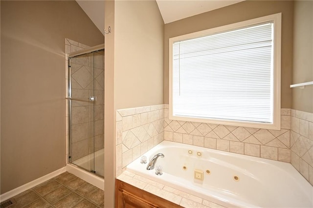 19617 Harbor Dr, Smithville, MO 64089 - full bath with a stall shower, a jetted tub, and tile patterned flooring