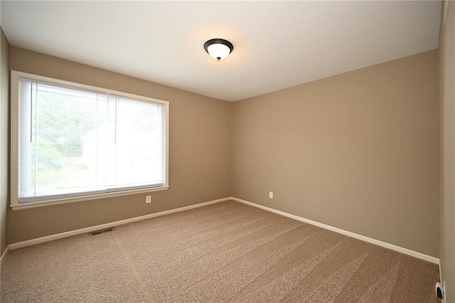 19617 Harbor Dr, Smithville, MO 64089 - carpeted spare room with plenty of natural light