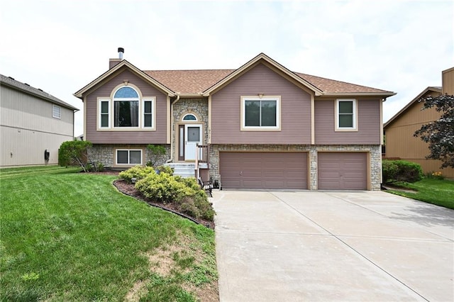 19617 Harbor Dr, Smithville, MO 64089 - bi-level home with a garage, concrete driveway, a front lawn, and a chimney