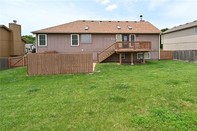19617 Harbor Dr, Smithville, MO 64089 - back of house featuring stairway, a fenced backyard, and a wooden deck