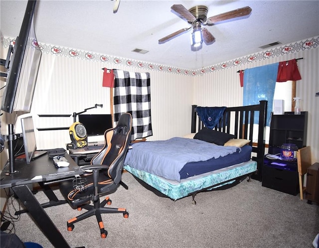 211 Southside Ct, Excelsior Springs, MO 64024 - bedroom with an office area, carpet floors, and ceiling fan
