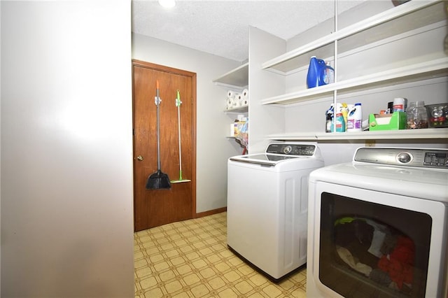 211 Southside Ct, Excelsior Springs, MO 64024 - laundry area with light flooring, independent washer and dryer, and a textured ceiling
