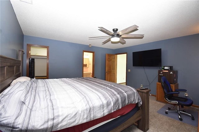 211 Southside Ct, Excelsior Springs, MO 64024 - carpeted bedroom featuring a desk and ceiling fan