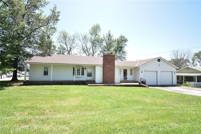 211 Southside Ct, Excelsior Springs, MO 64024 - ranch-style house with a garage, asphalt driveway, a front yard, and a chimney