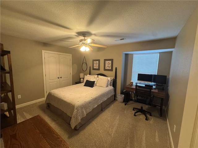 21086 Millridge St, Spring Hill, KS 66083 - bedroom with carpet flooring, a closet, a textured ceiling, and a ceiling fan